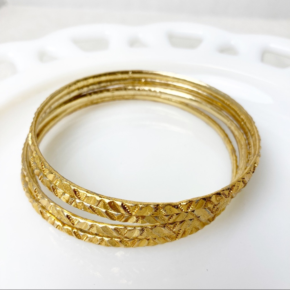 Vintage set of 5 gold tone bangle bracelets made in India